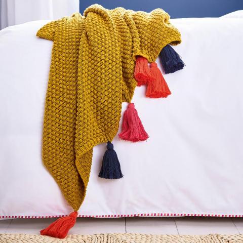 Cambridge Knit Tasseled Throw By Joules in Antique Gold