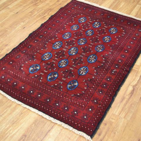 Thebes Hand Knotted Wool Rug in Red